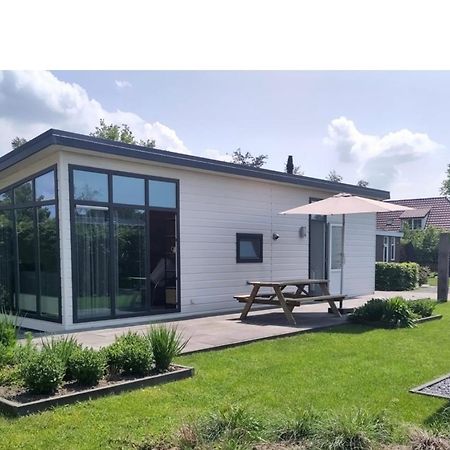 Knus Chalet Heidebloem Putten Bagian luar foto