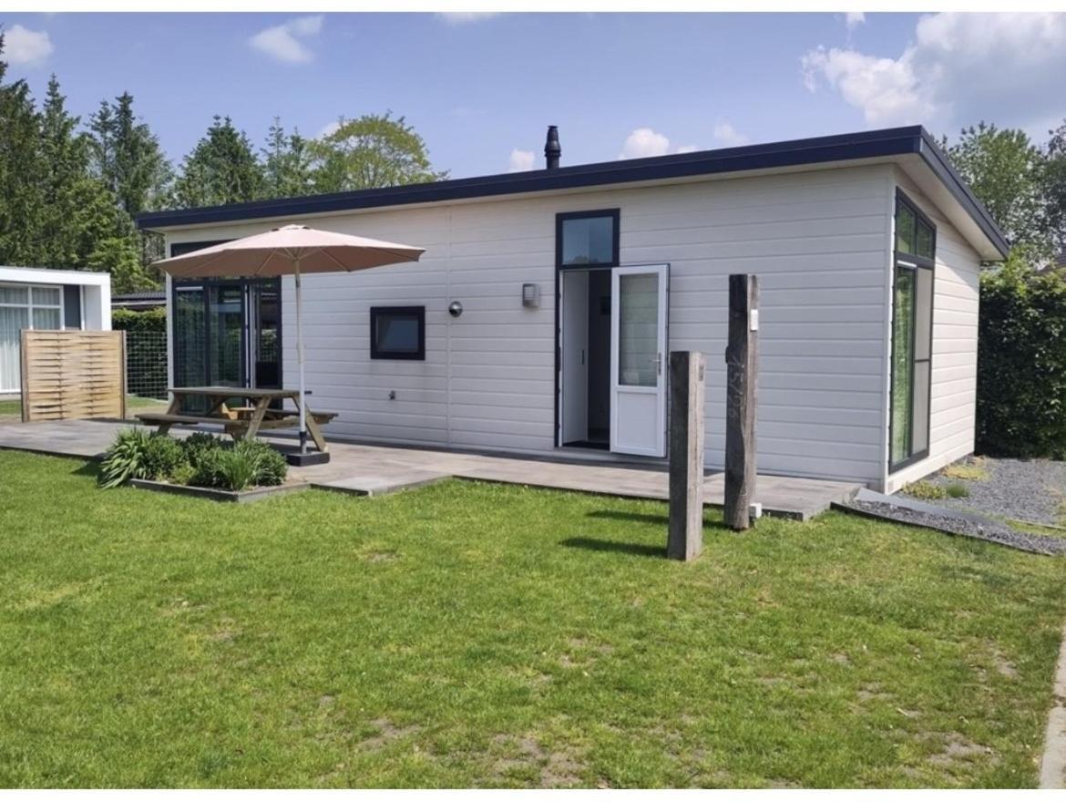 Knus Chalet Heidebloem Putten Bagian luar foto