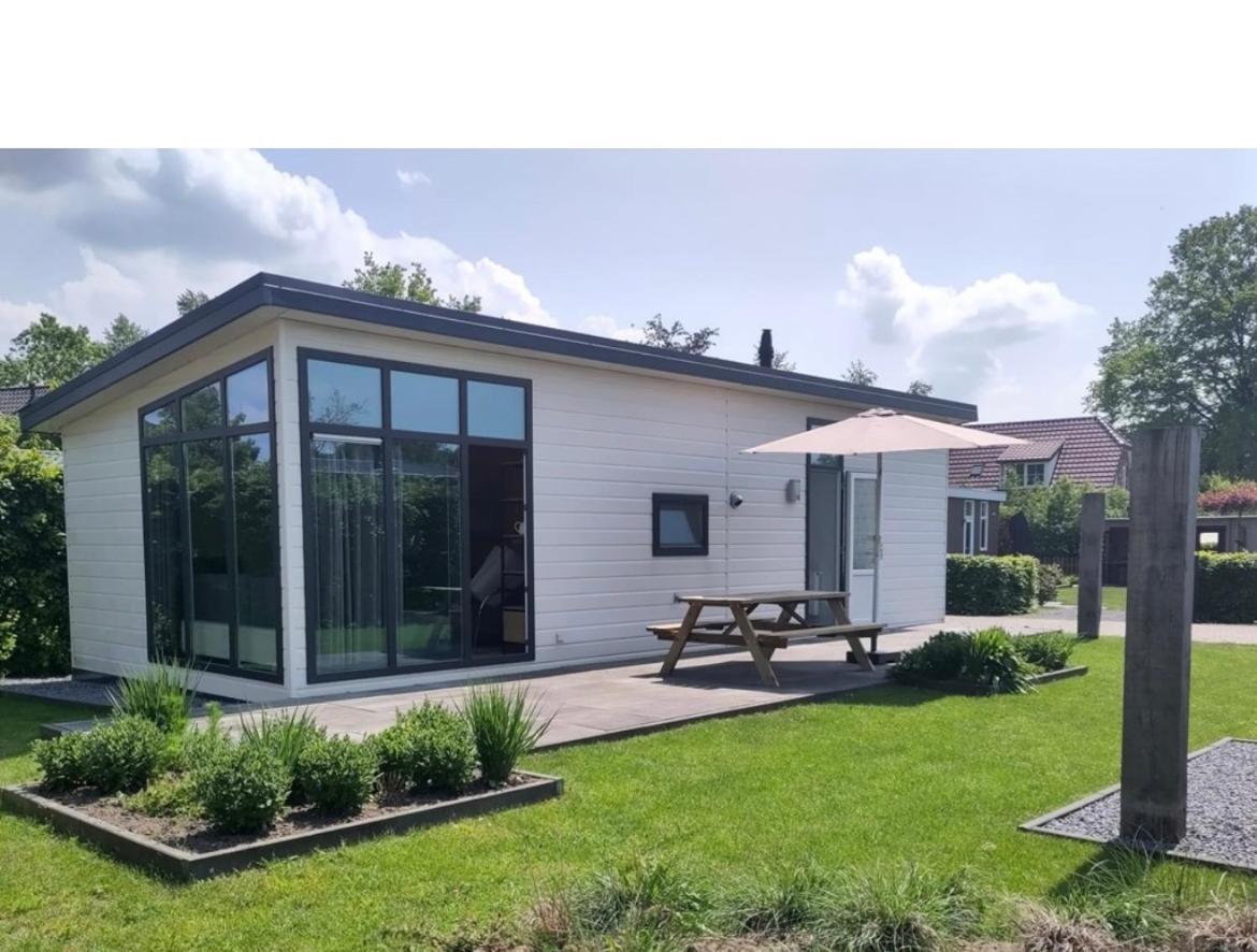 Knus Chalet Heidebloem Putten Bagian luar foto